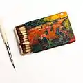 The Red Vineyards near Arles by Vincent Van Gogh painted on a matchbox