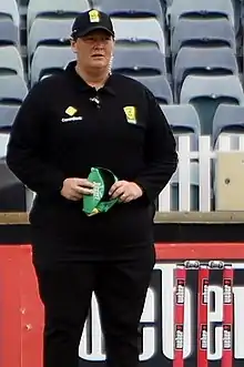 Redfern umpiring during WBBL
