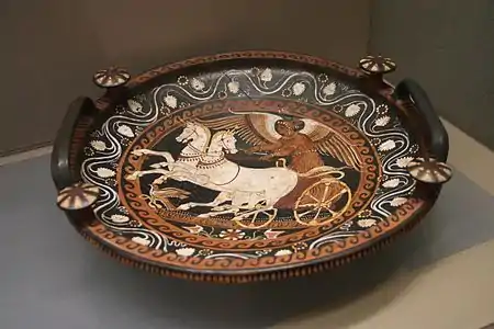 Nike driving a two-horse chariot (biga) on a patera (4th century BC, Apulia)