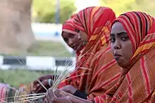 Image 19Somali women basket weaving (from Culture of Somalia)