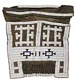 A beaded apron or meputo; late 19th-early 20th century; hide, glass beads, metal beads, straw; 46.9 × 50.8&nbsp;cm (18.5 × 20 in.); Birmingham Museum of Art (Alabama, USA)