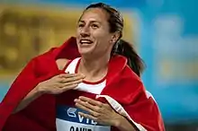 Aslı Çakır Alptekin celebrating her bronze medal performance in the 1500 metres.