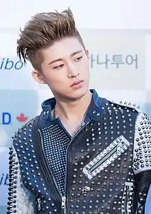 Image 109K-pop star B.I sporting an undercut hairstyle, 2016 (from 2010s in fashion)