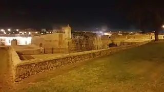 Night view of the right flank, to the north