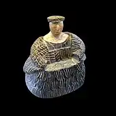 Female figurine of the "Bactrian princess" type; between 3rd millennium and 2nd millennium BC; chlorite mineral group (dress and headdresses) and limestone (face and neck); height: 17.3&nbsp;cm, width: 16.1&nbsp;cm; Louvre
