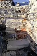Red and grey stone stairs.