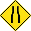 PF-1aRoad narrows ahead on both sides