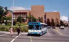 A Community Transit bus turning a corner to leave the University of Washington campus