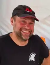 Head and shoulders portrait smiling