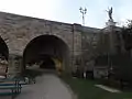 A pedestrian underpass under the bridges northernmost arch