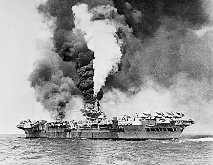 HMS&nbsp;Formidable on fire after a kamikaze attack on May 4. The ship was out of action for fifty minutes.