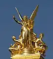 C. L'Harmonie (1869) by Charles Guméry is a 7.5-metre (25&nbsp;ft) tall sculpture that crowns the Palais Garnier (the Opera) in Paris, France. The statue is a gilded copper electrotype, sometimes called a galvanoplastic bronze.
