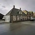 Wooden dike house