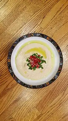 Hummus garnished with pomegranate seeds, from Helen Corey's Food from Biblical Lands (1989) cookbook