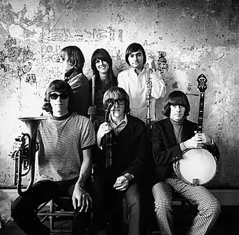 Jefferson Airplane photographed by Herb Greene in his dining room, San Francisco, late 1966; top row from left: Jack Casady, Grace Slick, Marty Balin; bottom row from left: Jorma Kaukonen, Paul Kantner, Spencer Dryden