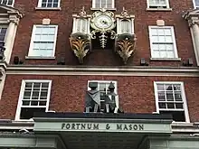 Lynn Chadwick, ‘King and Queen’, 1990, Bronze. Sited above the entrance to Fortnum and Mason, Piccadilly, London.