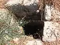 Mouth of deep well, in dale northwest of Dhikrin