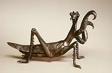 Murata Seimin (1761–1837), Brush rest in the shape of a praying mantis, circa 1800 (late Edo), Medium: bronze, Dimensions: 18&nbsp;cm (7&nbsp;in), Japan. Collected By the Walters Art Museum.