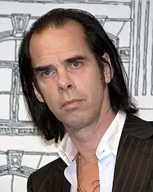 Nick Cave to the side of the camera