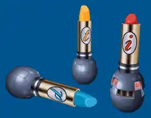 An image of three objects that look like lipsticks, each with a small round base. The lipsticks are marked with the letter 'p', 't', and 'i', respectively.