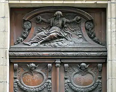 Carvings over the portal on Rue des Bernardins
