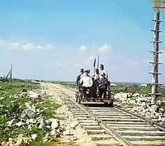 Handcar riding along the Murmansk railroad, on the shore of Lake Onega. (circa&nbsp;1916)
