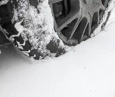 Compaction of snow under an advancing snow tire, causing rolling resistance while passing through about 10 centimetres (4&nbsp;in) of snow.