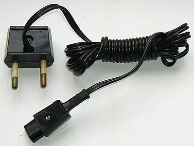 Soviet shaver power cord. The plug is similar to CEE&nbsp;7/16, but has different configuration. Thermoplastic plug is rated 6&nbsp;A and 250&nbsp;V.
