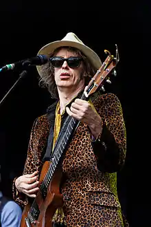 Scott performing at a concert in 2012