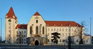 A color photo of a large building, the Theresan Military Academy, as seen from the outside