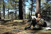 Third Phase A student plots coordinates on his map during an individual land navigation exercise in Mount Laguna.