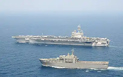 USS&nbsp;George H.W. Bush underway with RSS Endeavour in the Gulf of Aden.
