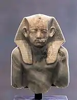 Upper part of portrait statuette of pharaoh Amenemhat III, wearing a nemes, c. 1853&nbsp;– c. 1805&nbsp;BCE
