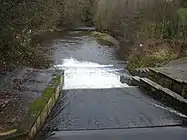 Weir on Sea Cut from A171 bridge looking east.