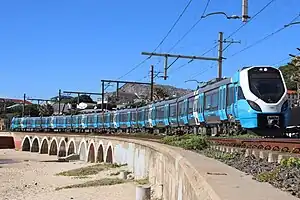 A Metrorail train running near Kalk Bay station.