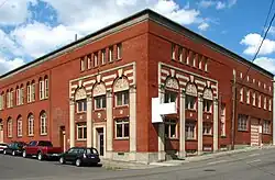 Photograph of a brick industrial building