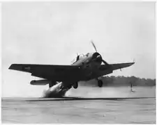 A Grumman TBF torpedo bomber taking off with the aid of 330 horsepower (250&nbsp;kW) jet-assisted unit in about half the normal run.